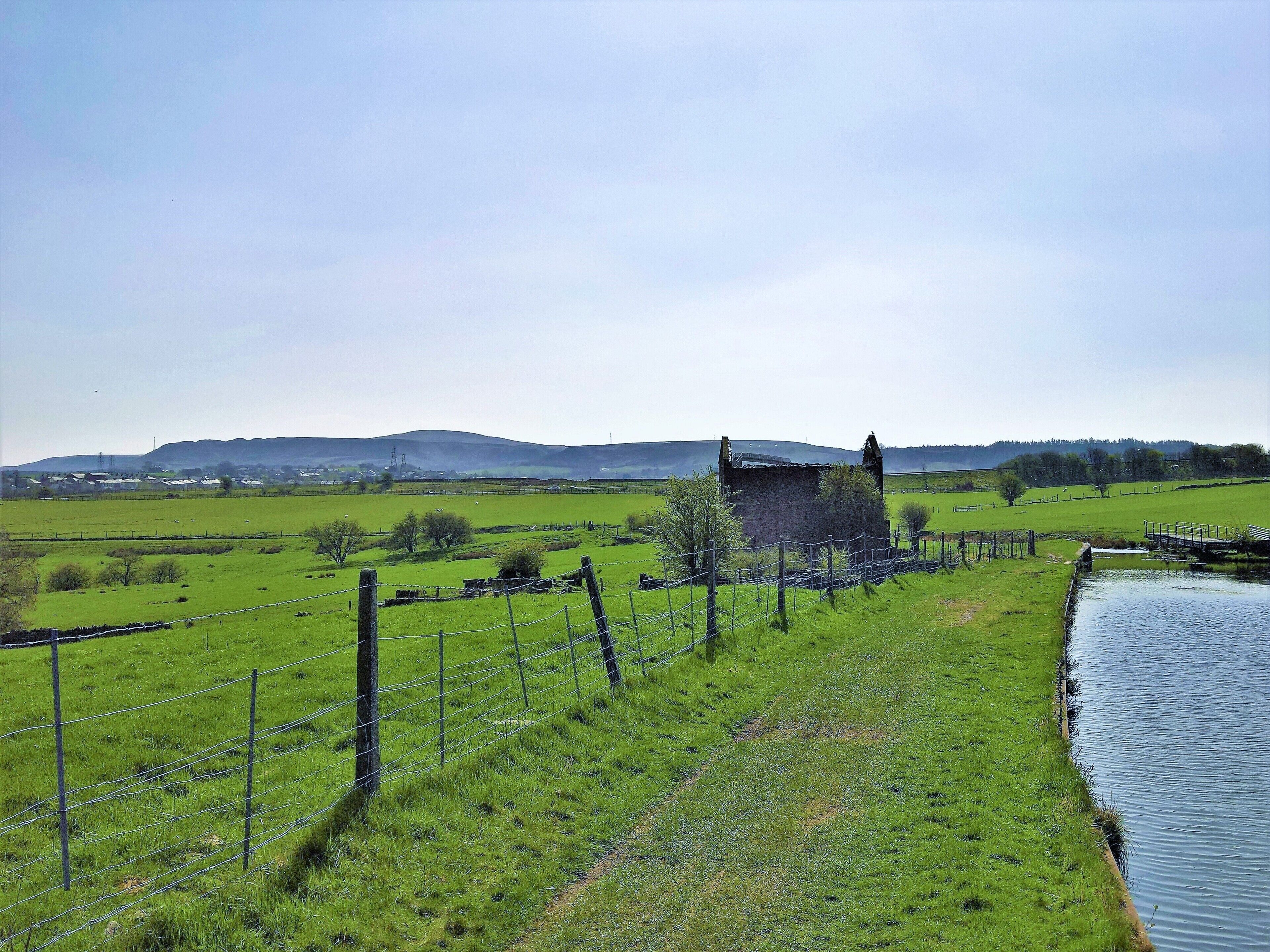 The abandoned Lower Clough Bank Farm on the Leeds and Liverpool Canal in the civil parish of Altham, Lancashire.