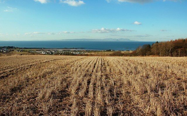 Maidens View Looking towards the village of Maidens from nearby barley fields. The island of Arran is visible on the skyline.