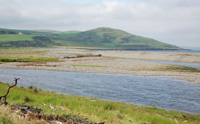 Ballantrae Spit. Shingle spit at the mouth of River Stinchar with Downan Hill to South