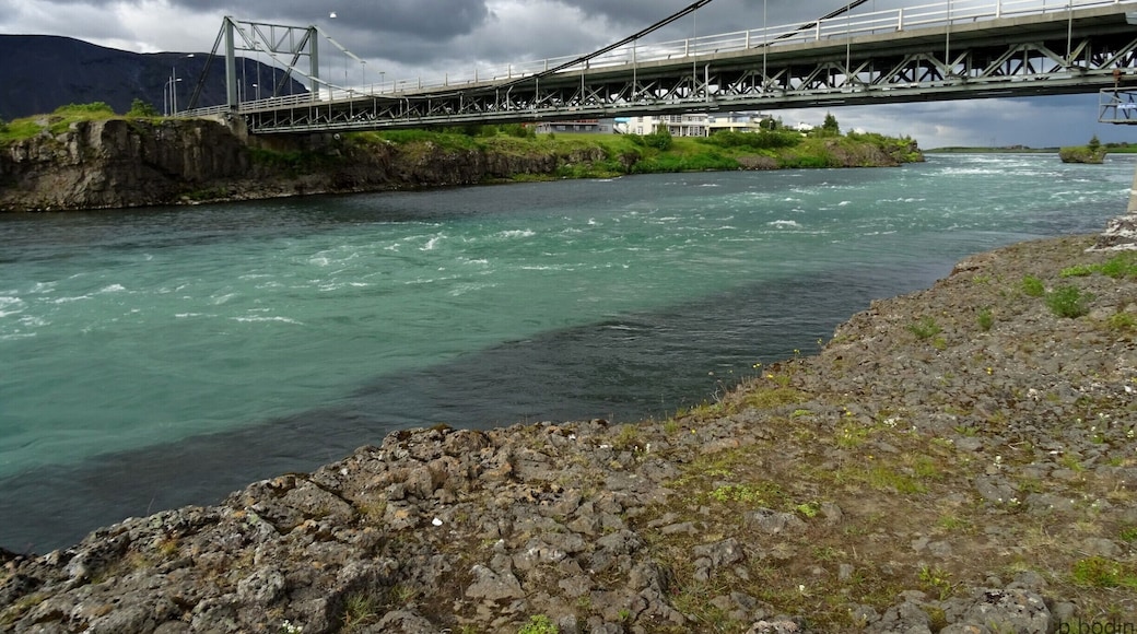 The bridge over the beautiful blue river in Selfoss