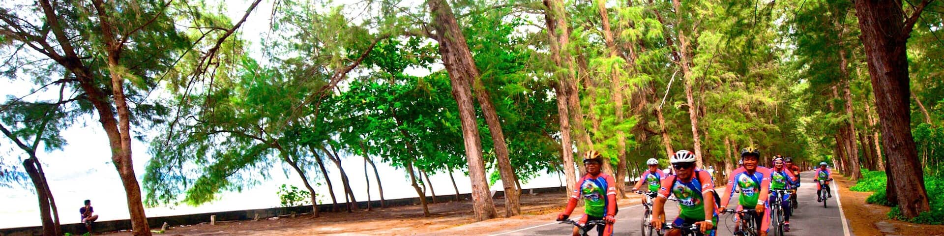 Rayong featuring road cycling as well as a large group of people