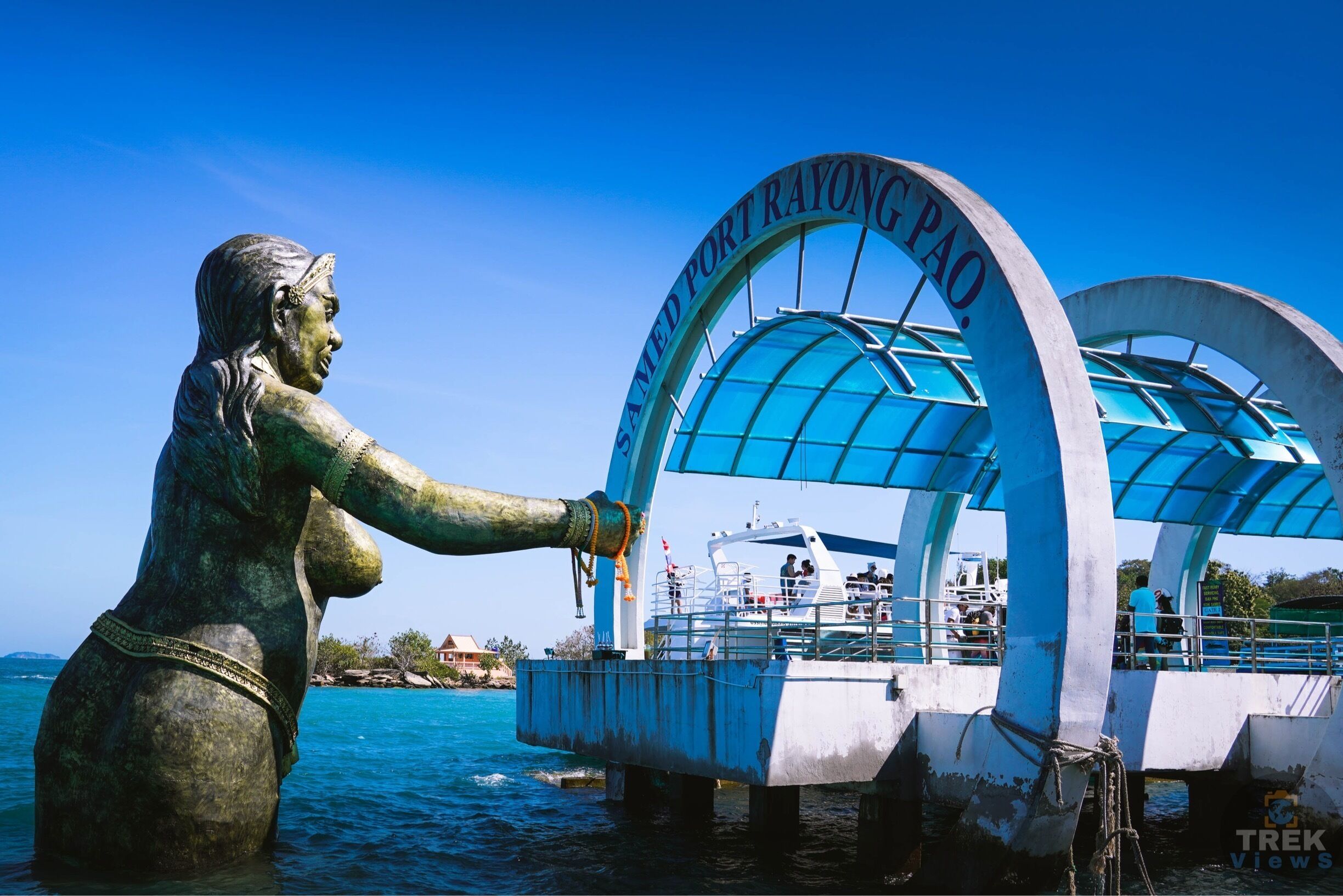 Island Views: Rang in the New Year on Koh Samet, where visitors are greeted by a giant statue of an ogress.  #sonycamera #sonya7riii #travel #travelphotography #asia #southeastasia #thailand #rayong #kohsamet #kohsamed #island #bluesky #bluewater #pier #statue #amzthld #thailandinsider #lonelyplanet #lpfanphoto #wanderlust