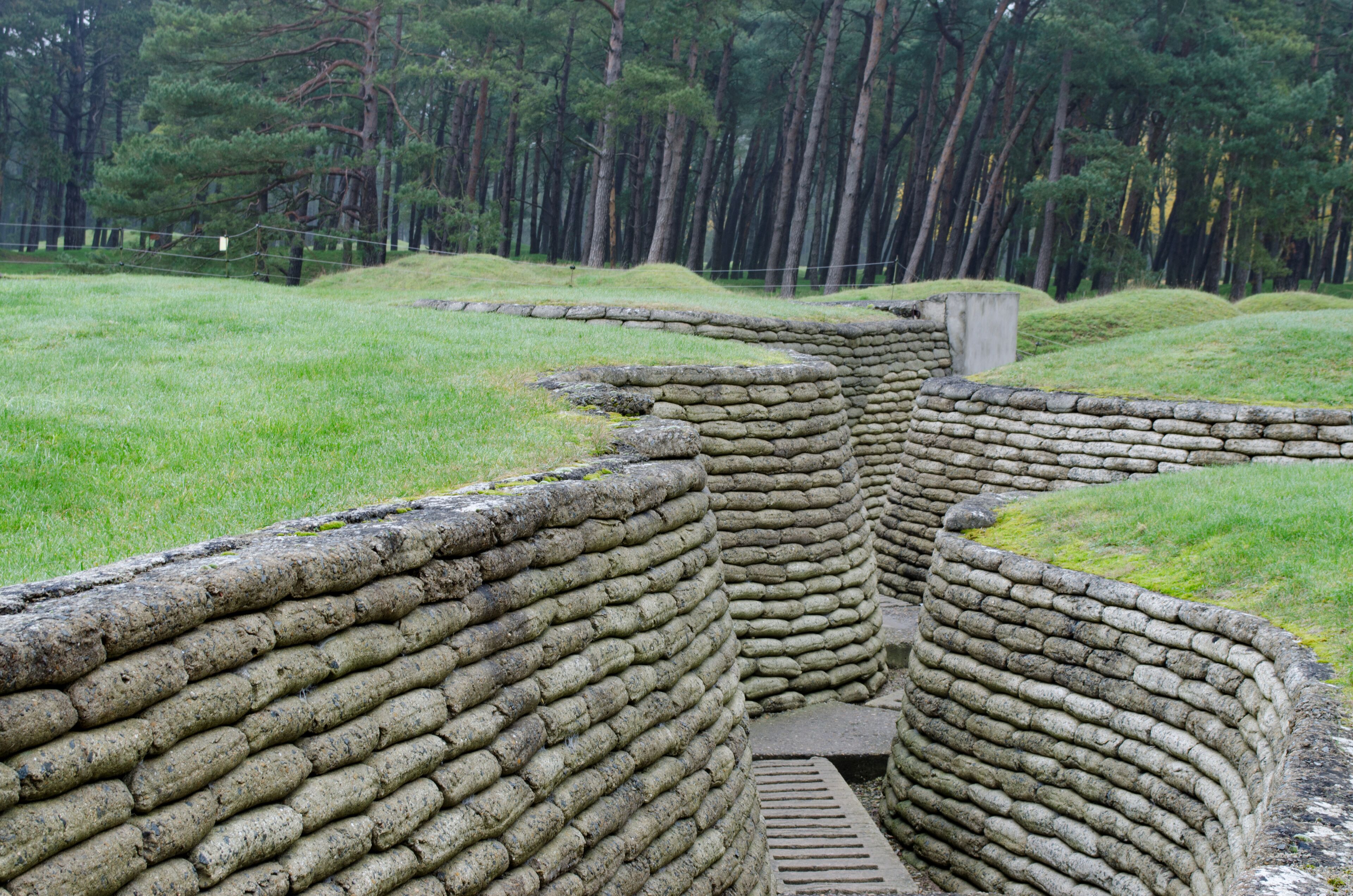 Reconstructed trenches made using concrete moulded sand bags 