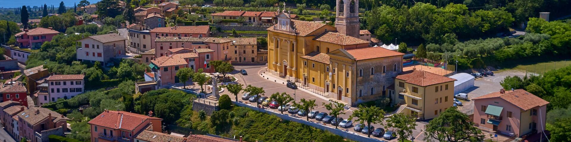 Photo with drone. Beautiful view of the city of Cavaion Veronese and its surroundings of Lake Garda, Italy.