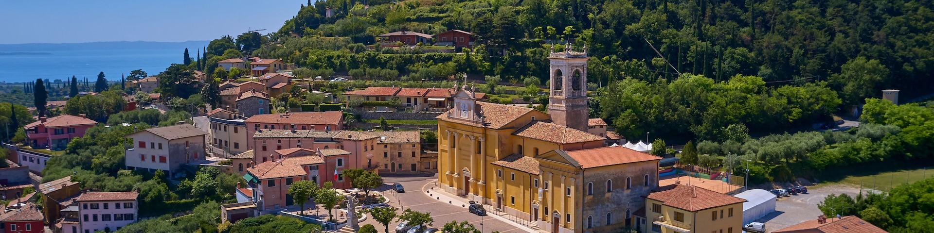Photo with drone. Beautiful view of the city of Cavaion Veronese and its surroundings of Lake Garda, Italy.