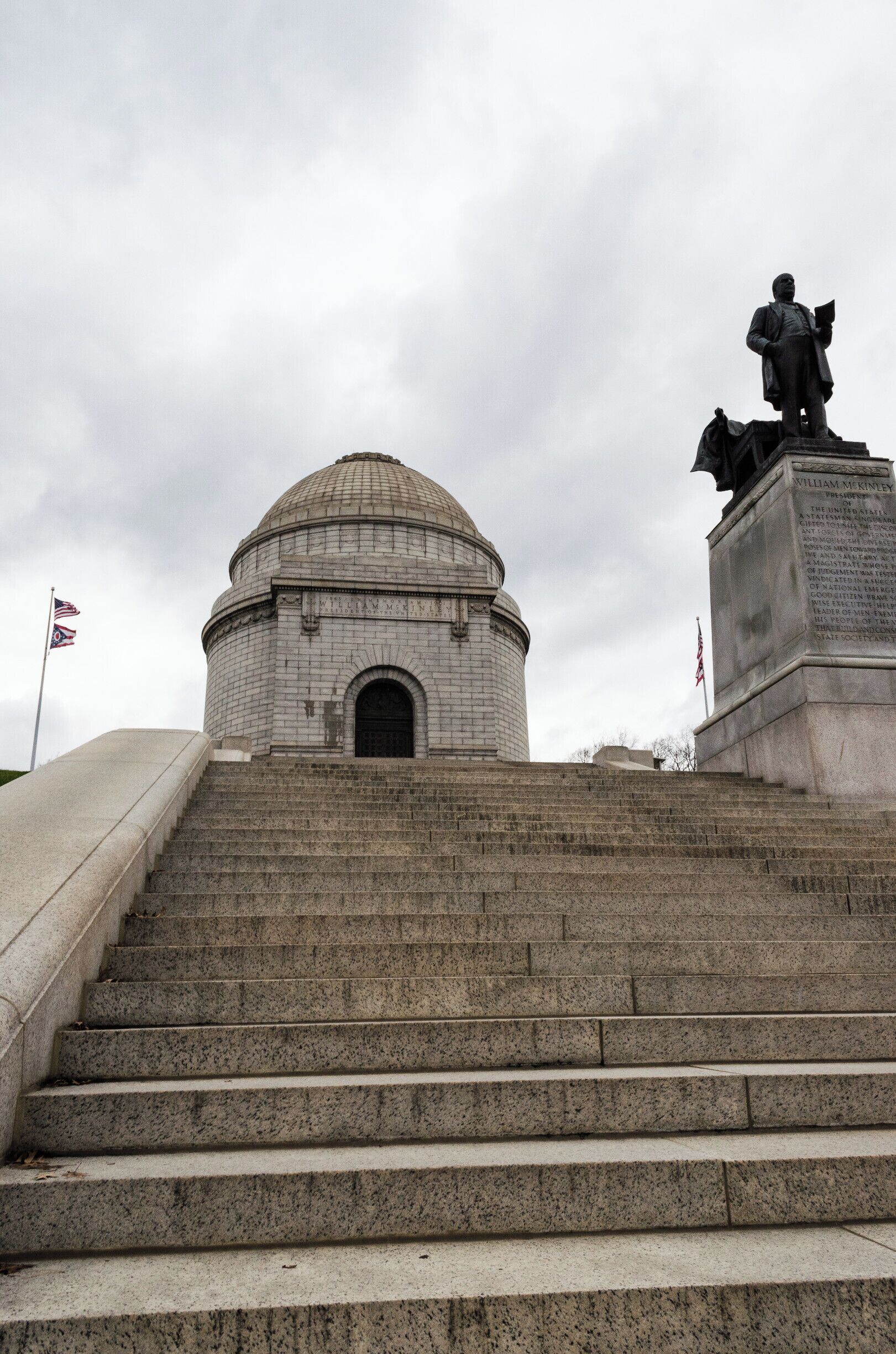 The William McKinley Memorial is a Canton, Ohio landmark, and is the final resting place of the 25th U.S. President and his wife Ida. The site also houses the William McKinley Presidential Library and Museum and a large public park.
McKinley was born in Niles, Ohio but began his career in Canton, the city he called home. McKinley was also the 39th Governor of Ohio. On September 6th 1901, six months into his second term as President, McKinley was shot by a Polish American anarchist. He died 8 days later on September 14th. He was succeeded by his vice president Theodore Roosevelt. The monument, which has 108 steps leading up to its doors, is a very popular destination for area fitness fans who jog up and down the steps throughout the day.
https://mckinleymuseum.org/mckinley-memorial/