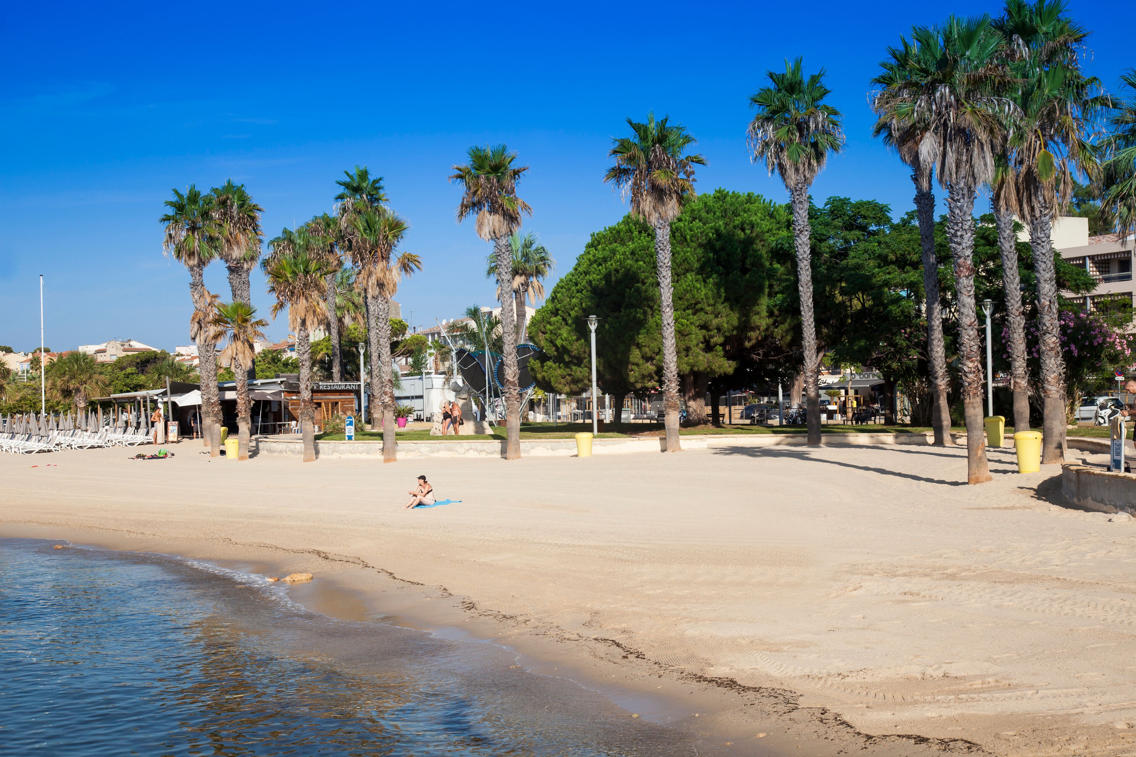 Sandy beach on the seafront of, Bandol, Alpes-Maritimes, Cote d'Azur, South of France, France, Europe