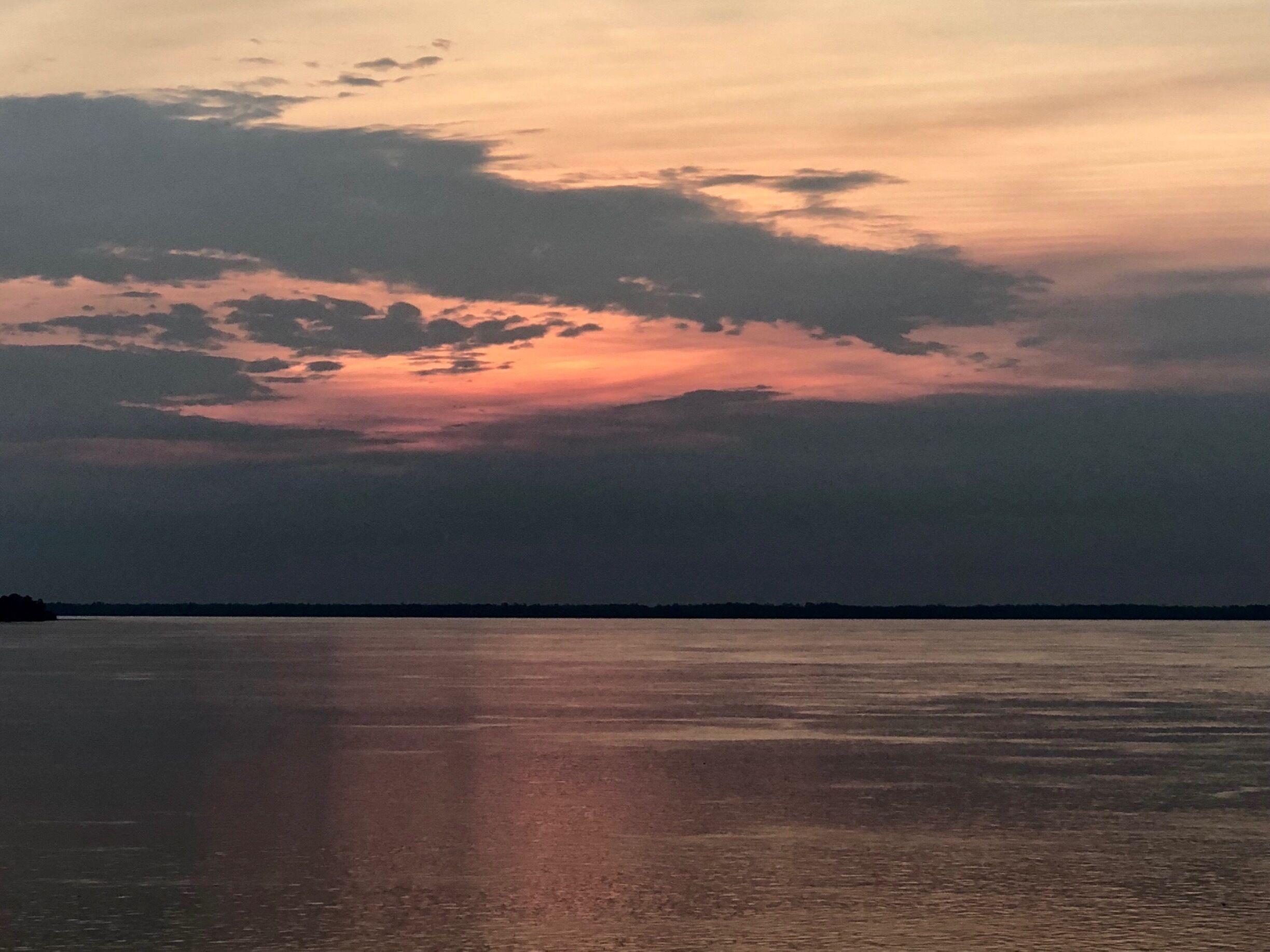 Continuing our westbound travels on the Amazon River as we make our way from Santarém to Manaus.  The sunset actually turned the river shades of silver, pink and purple for a bit.