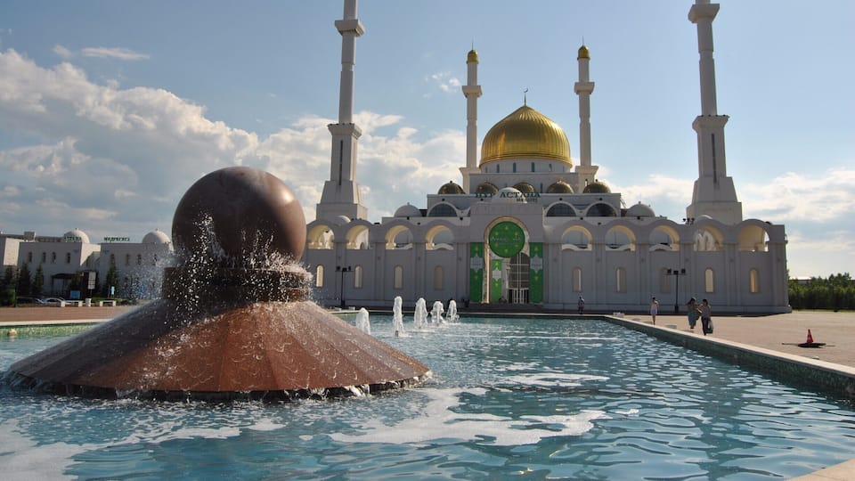 The Nur Astana Mosque is one of my favourite buildings in my neighbourhood on the left bank of Astana. It blends right in with the futuristic architecture in its background as well as the lush trees on its property.