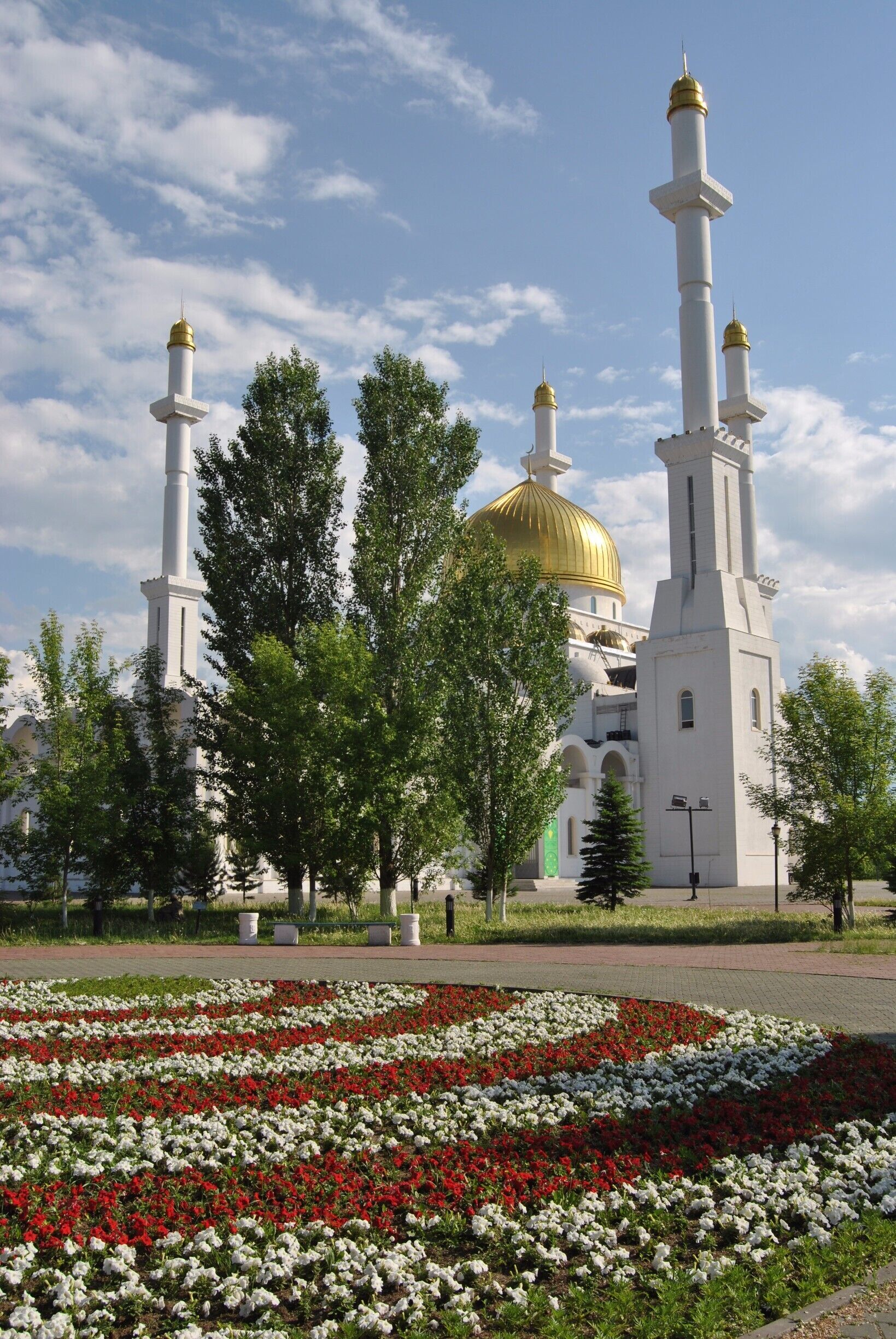 The Nur Astana mosque - beautiful in all seasons but especially with its green tree friends under blue skies.