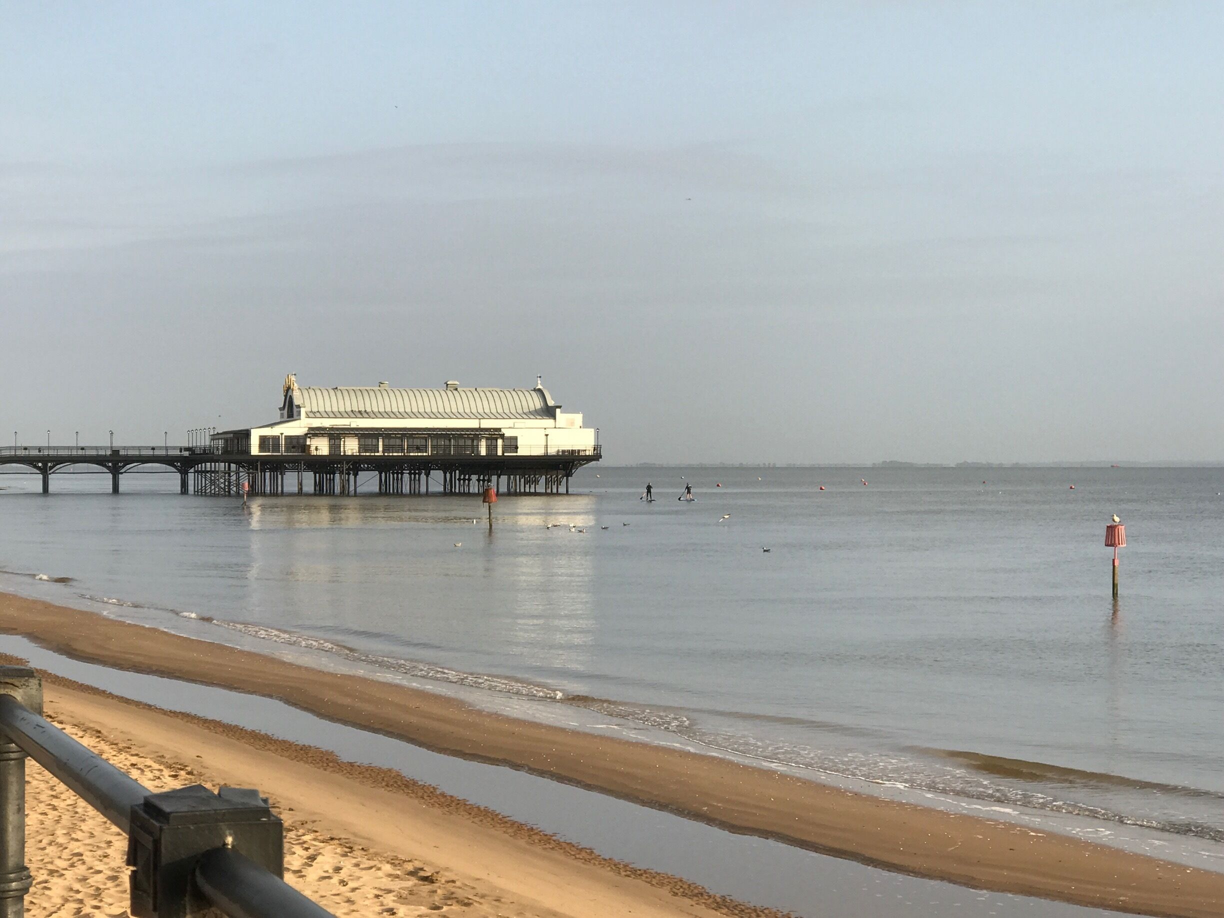 The pier at Cleethorpes, tide coming in.