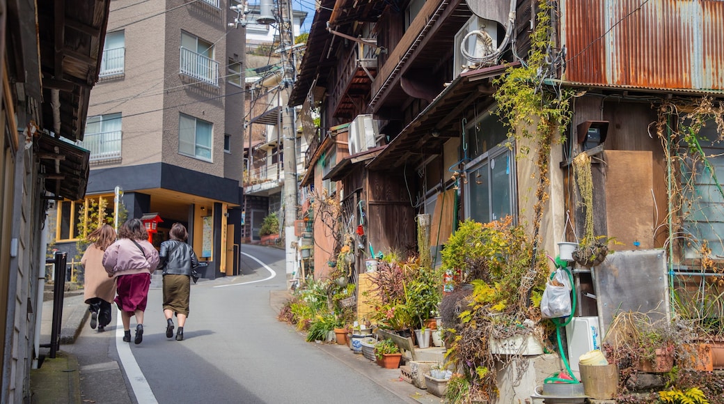 Atami featuring street scenes as well as a small group of people