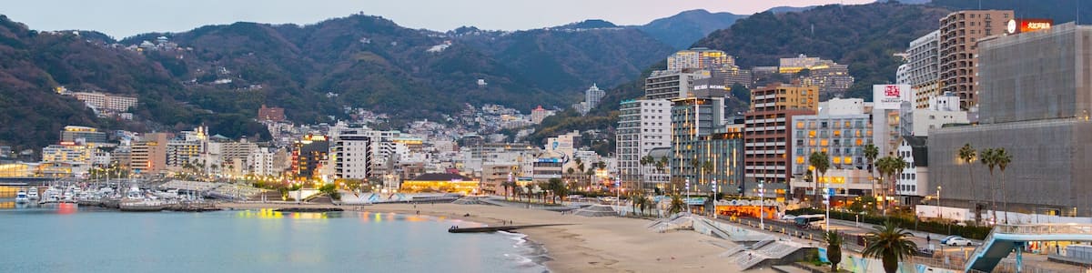 Atami featuring a bay or harbor and a coastal town