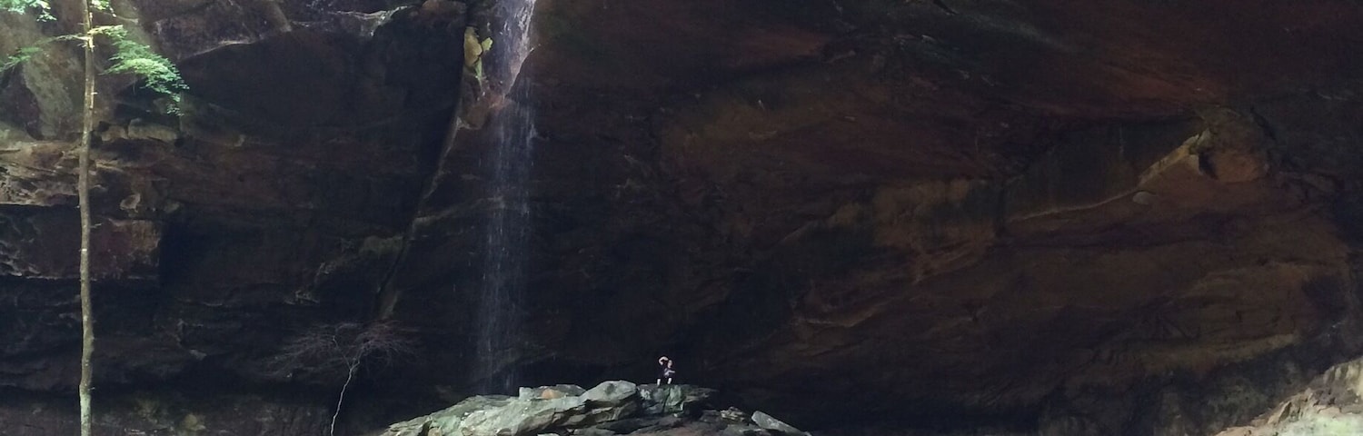 To give perspective of the size of the cliff, my daughter is in the middle of this picture. She is the tiny speck waving in the center of the pic sitting on the rocks.