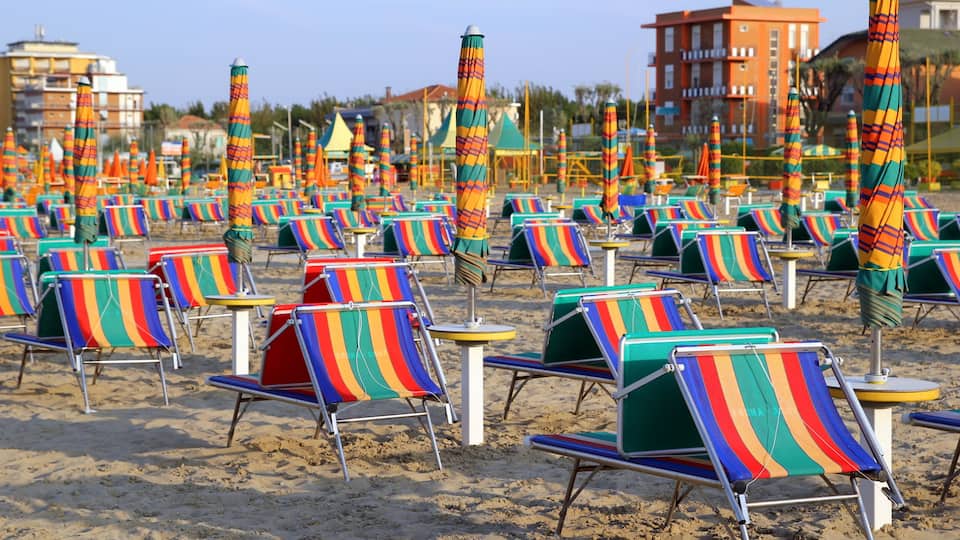 Rimini, Italy. The empty beach with a lot of sunbeds and umbrellas.