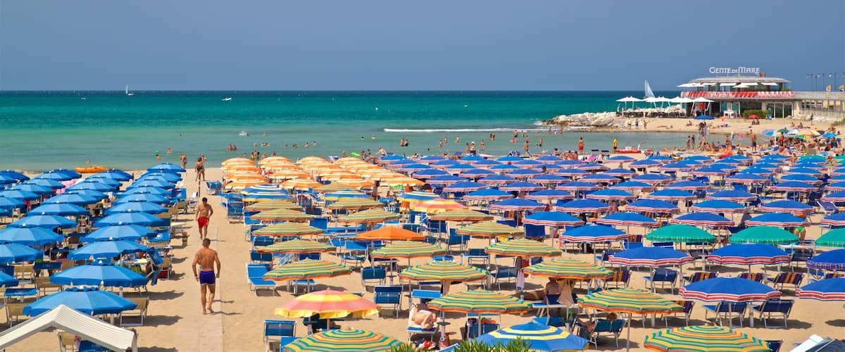 Cattolica which includes general coastal views and a beach