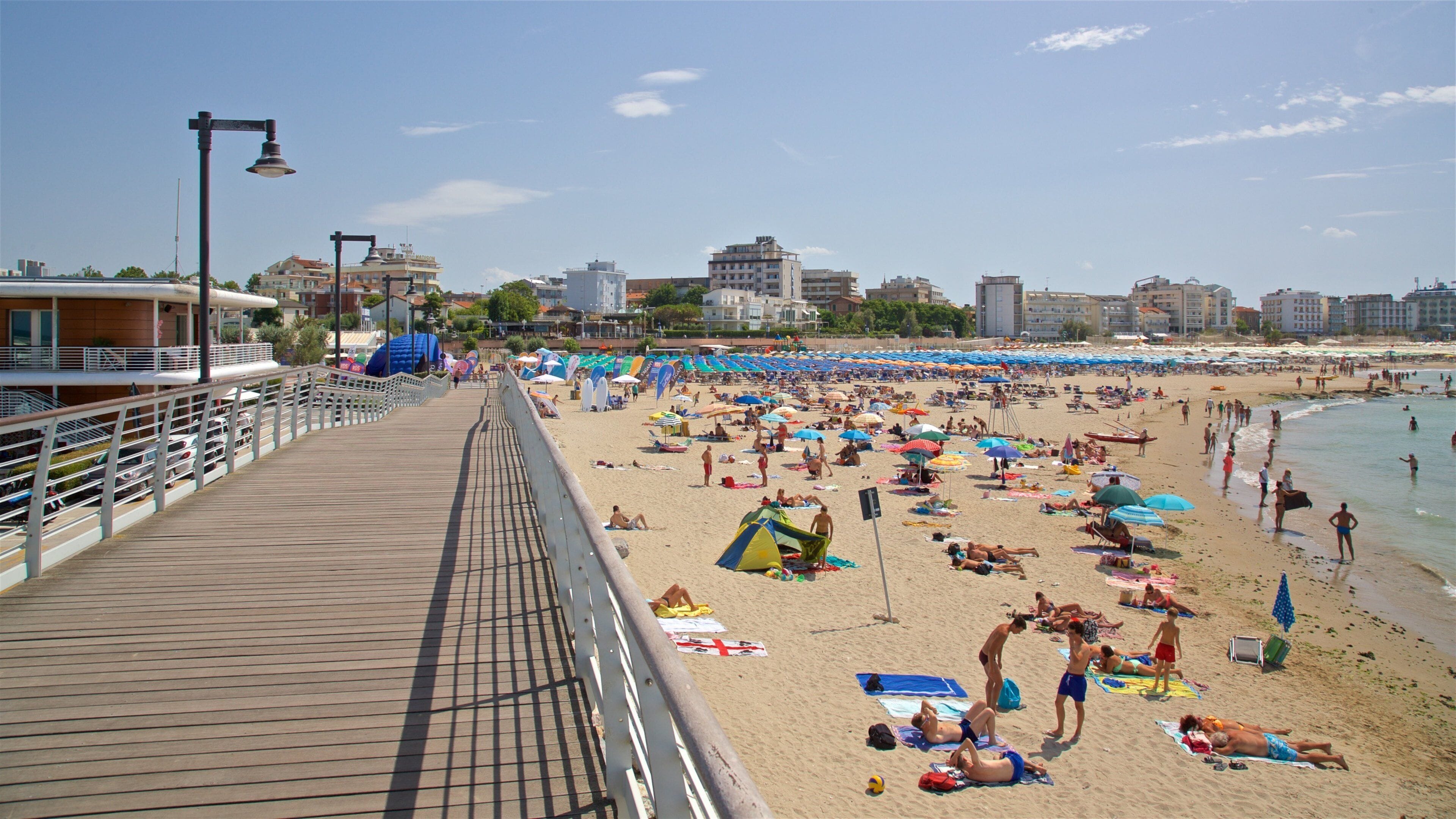 Cattolica featuring general coastal views, a sandy beach and a bridge