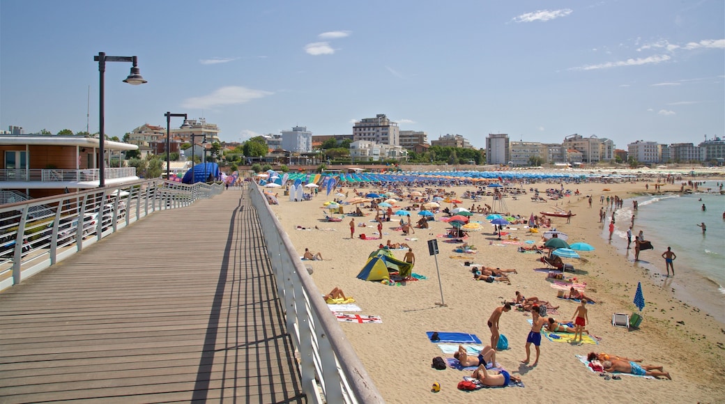 Cattolica featuring general coastal views, a sandy beach and a bridge