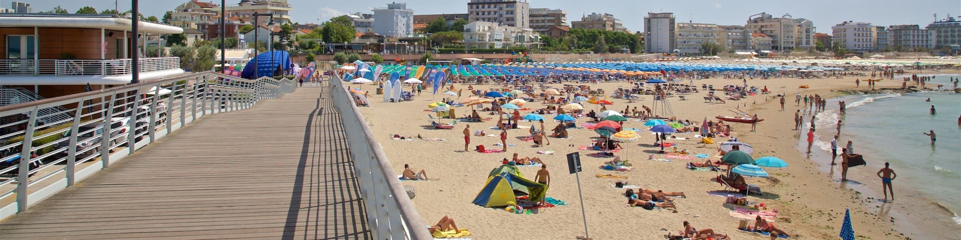 Cattolica featuring general coastal views, a sandy beach and a bridge