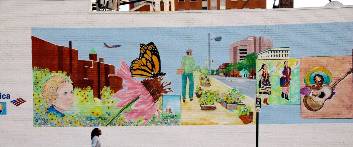 Manchester featuring outdoor art as well as an individual female