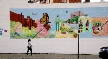 Manchester featuring outdoor art as well as an individual female