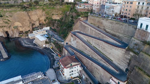 Sorrento Coast. Aerial photo of the Marina di Cassano port in Piano di Sorrento. Characteristic landscape of the city on the cliff overlooking the sea