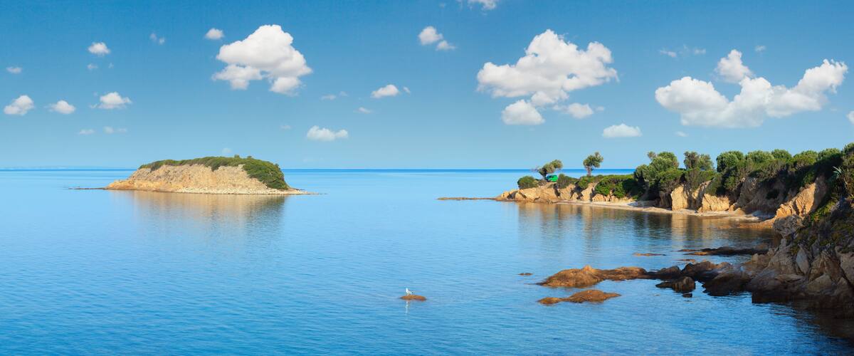 Morning Aegean Sea rocky coast view (Nikiti, Sithonia, Halkidiki, Greece).