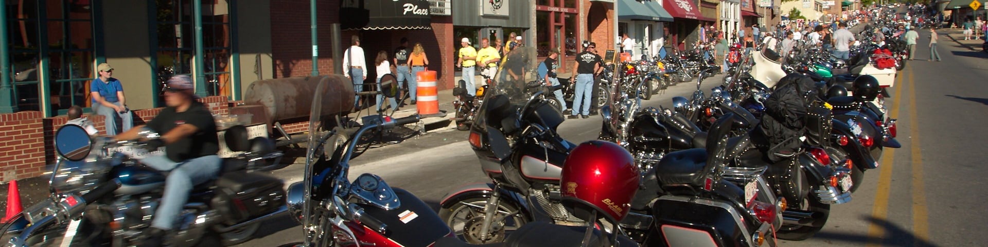 Bentonville - Fayetteville featuring motorcycle riding, street scenes and heritage elements