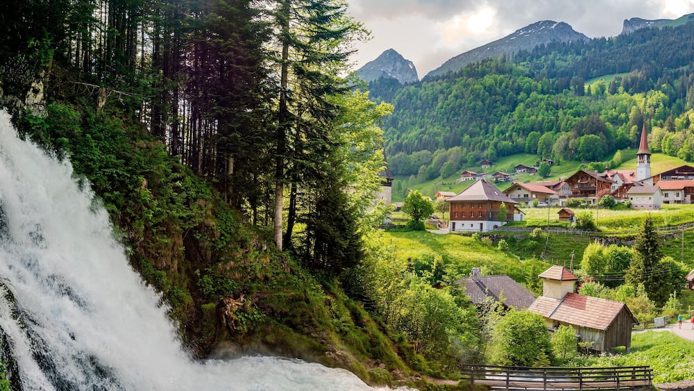 Waterfall in jaun in alps mountain. kanton Fribourg, Freiburg nearby Bulle, Bern, Thun. Good hiking tourist way. Switzerland