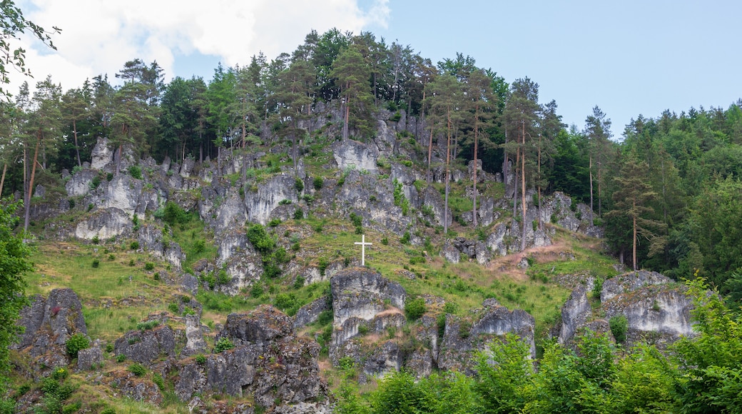 Climbing rock Altarstein with summit cross in Obertrubach in Franconian Switzerland, Germany