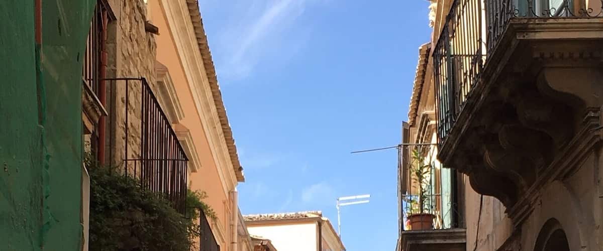 Looking at some of the pictures on how quaint, I thought this also fitted. One of many beautiful little narrow streets in Sicily, this one is in Ragusa, beautiful baroque buildings