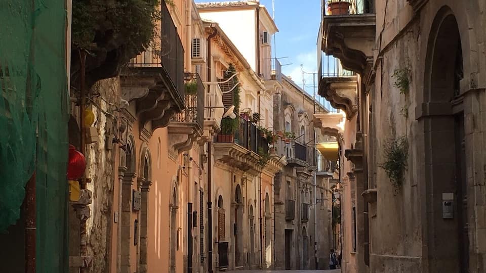 Looking at some of the pictures on how quaint, I thought this also fitted. One of many beautiful little narrow streets in Sicily, this one is in Ragusa, beautiful baroque buildings