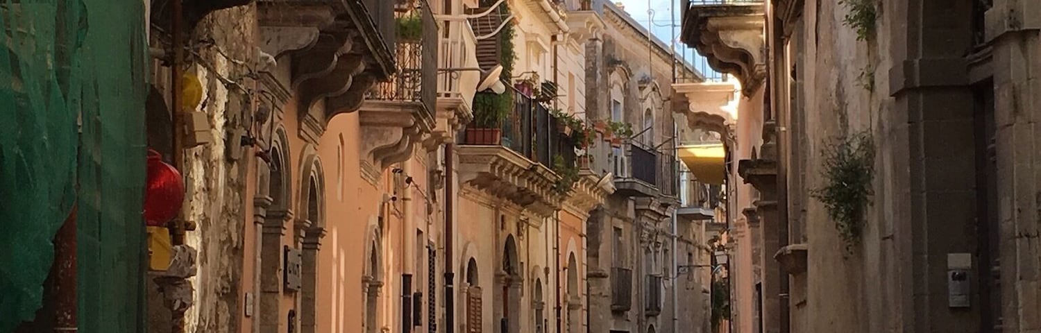 Looking at some of the pictures on how quaint, I thought this also fitted. One of many beautiful little narrow streets in Sicily, this one is in Ragusa, beautiful baroque buildings