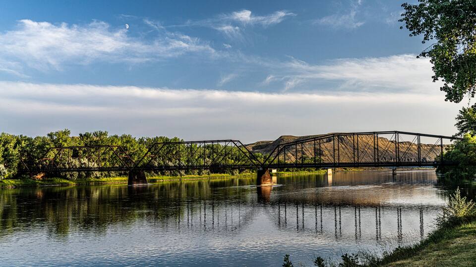 Fort Benton Historic 'Old Bridge' across the Missouri River in 'sleepy little river town' Fort Benton. Built in 1888. It has five pin-connected truss spans.