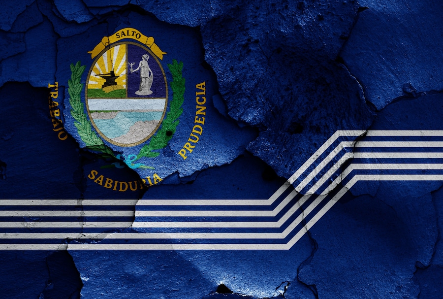 flag of Salto Department painted on cracked wall