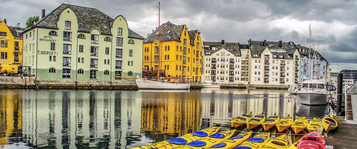 Alesund has many colourful buildings on a waterfront setting.