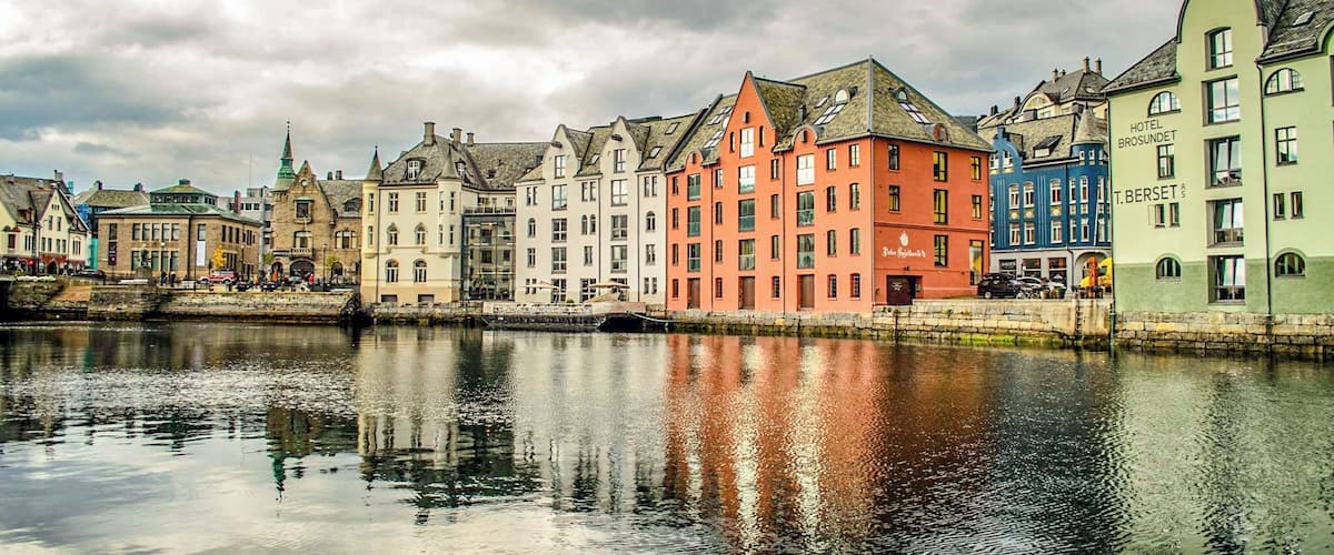 Buildings reflected on the waterfront.