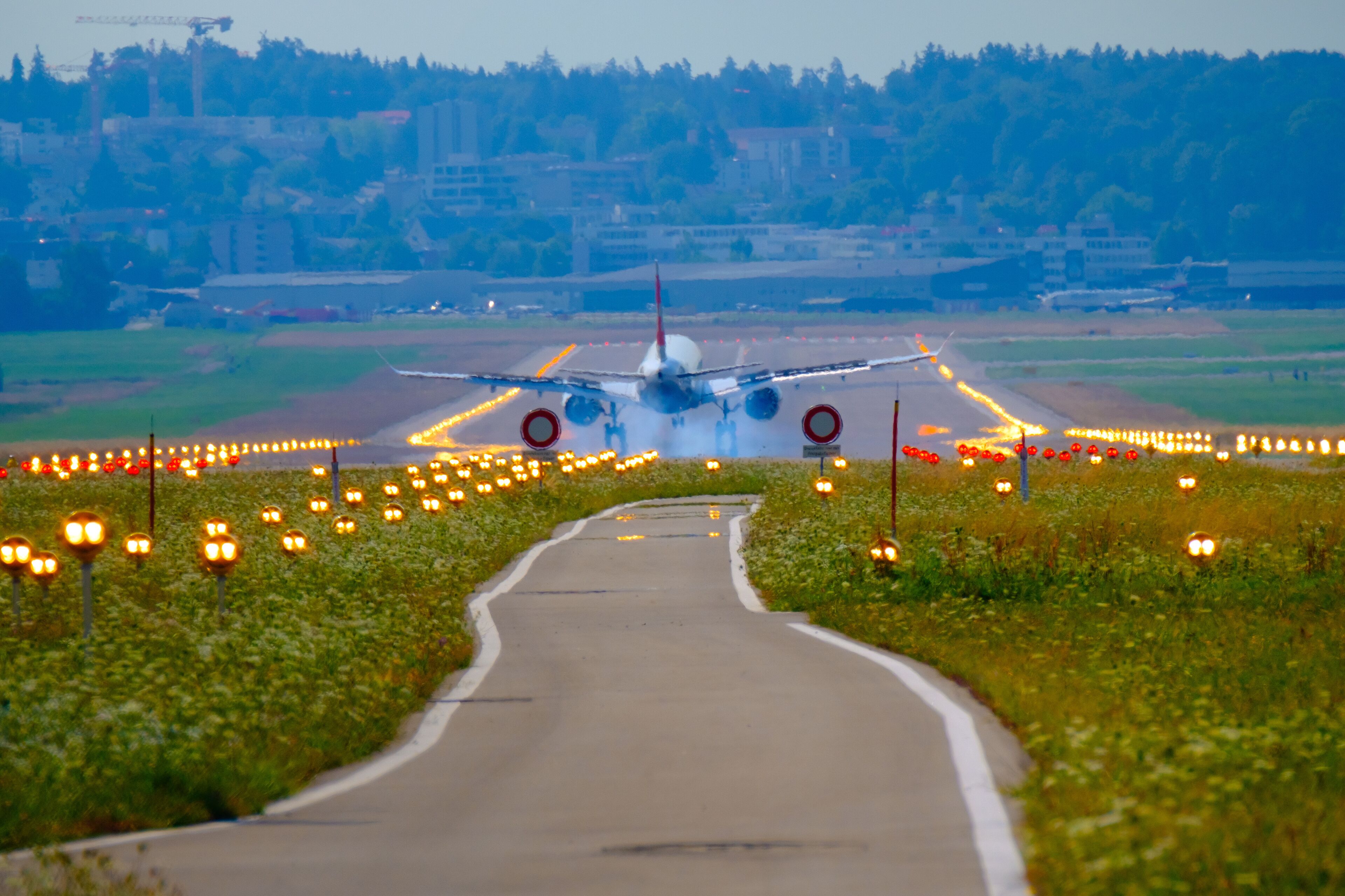 Airplane landing at airport runway