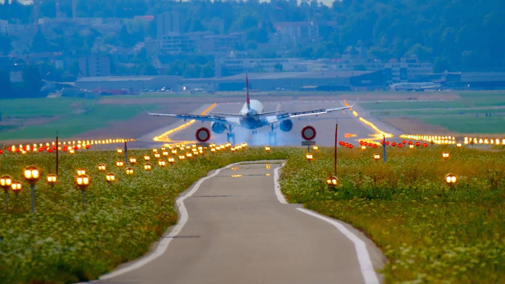 Airplane landing at airport runway