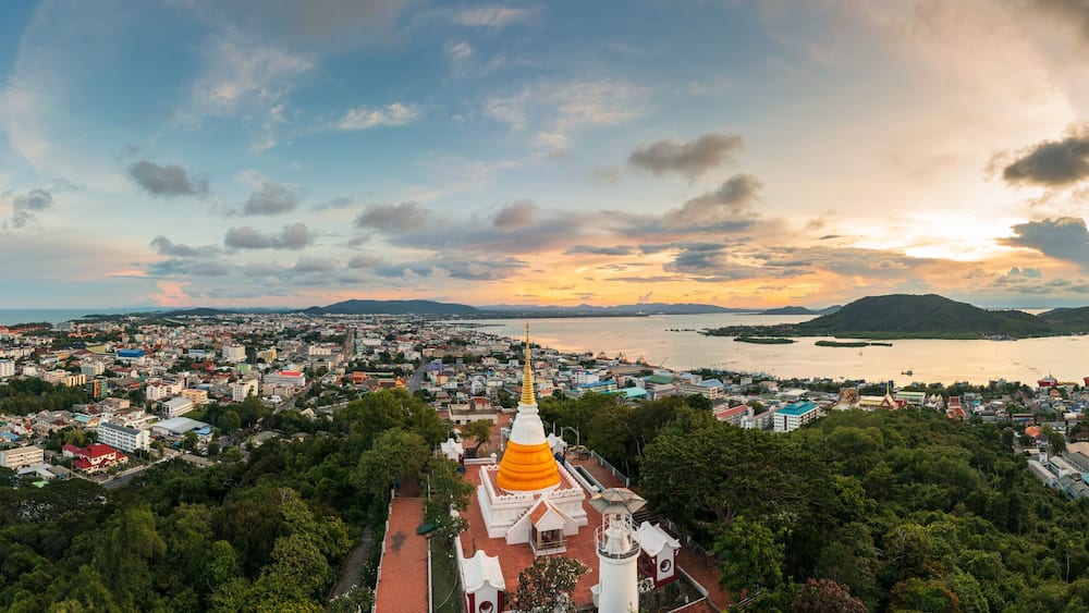 Aerial panoramic landscape of old Pagoda at Tang Kuan Hill and Cityscape in background, Mueang Songkhla, Thailand.