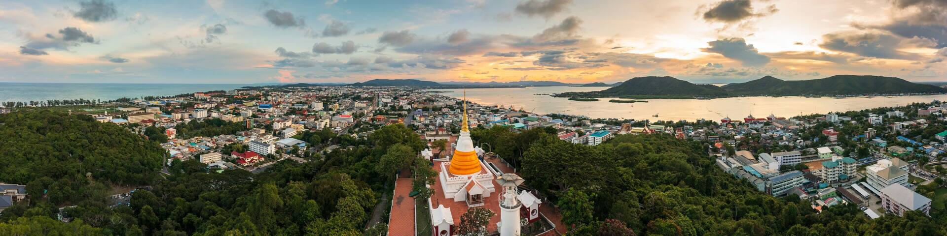 Aerial panoramic landscape of old Pagoda at Tang Kuan Hill and Cityscape in background, Mueang Songkhla, Thailand.
