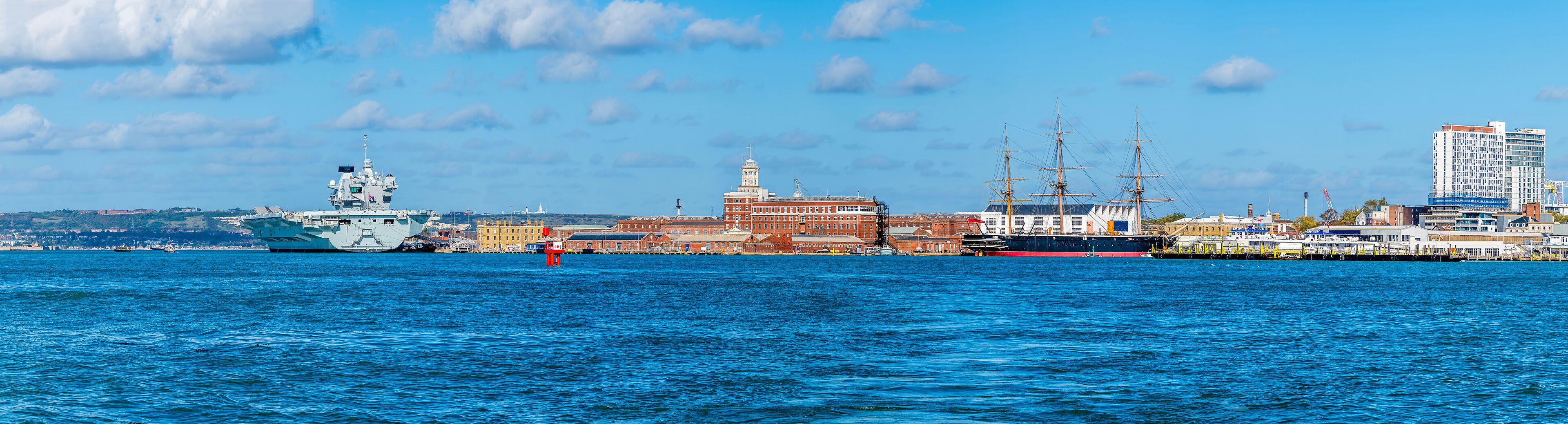 A panorama view from Gosport across the historic dockyard at Portsmouth, UK in early Autumn