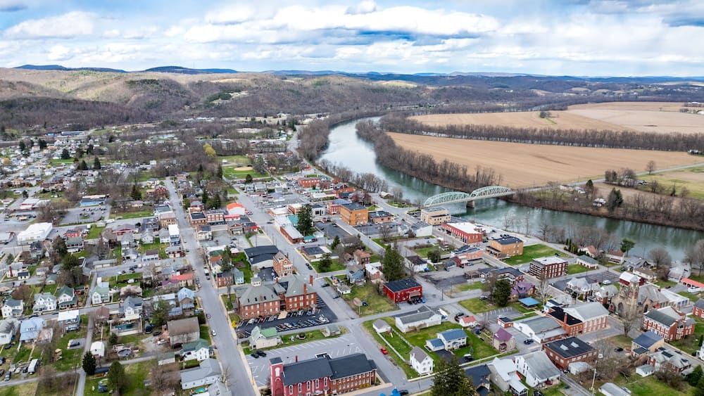 Jersey Shore, PA, USA - 03-17-2024 - Cloudy winter / spring aerial image of the borough, downtown area of Jersey Shore, Pennsylvania.