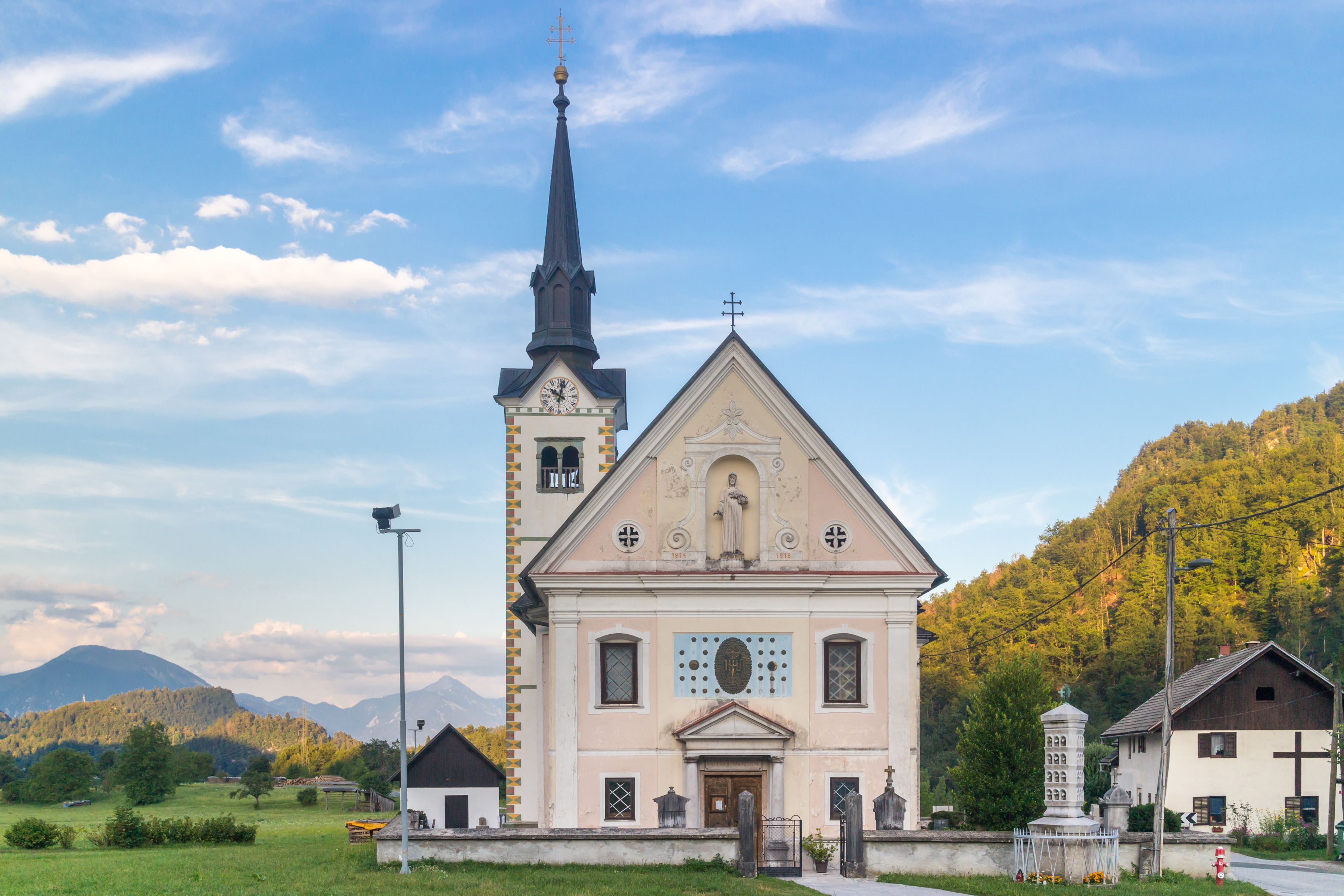 Traditional catholic church in Bohinjska bela village, near Bled, Slovenia.