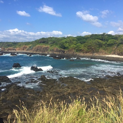 Drive on dirt roads and through rivers forever to get to this beautiful almost-private beach. Couple little shops in "town" for coffee & snacks.