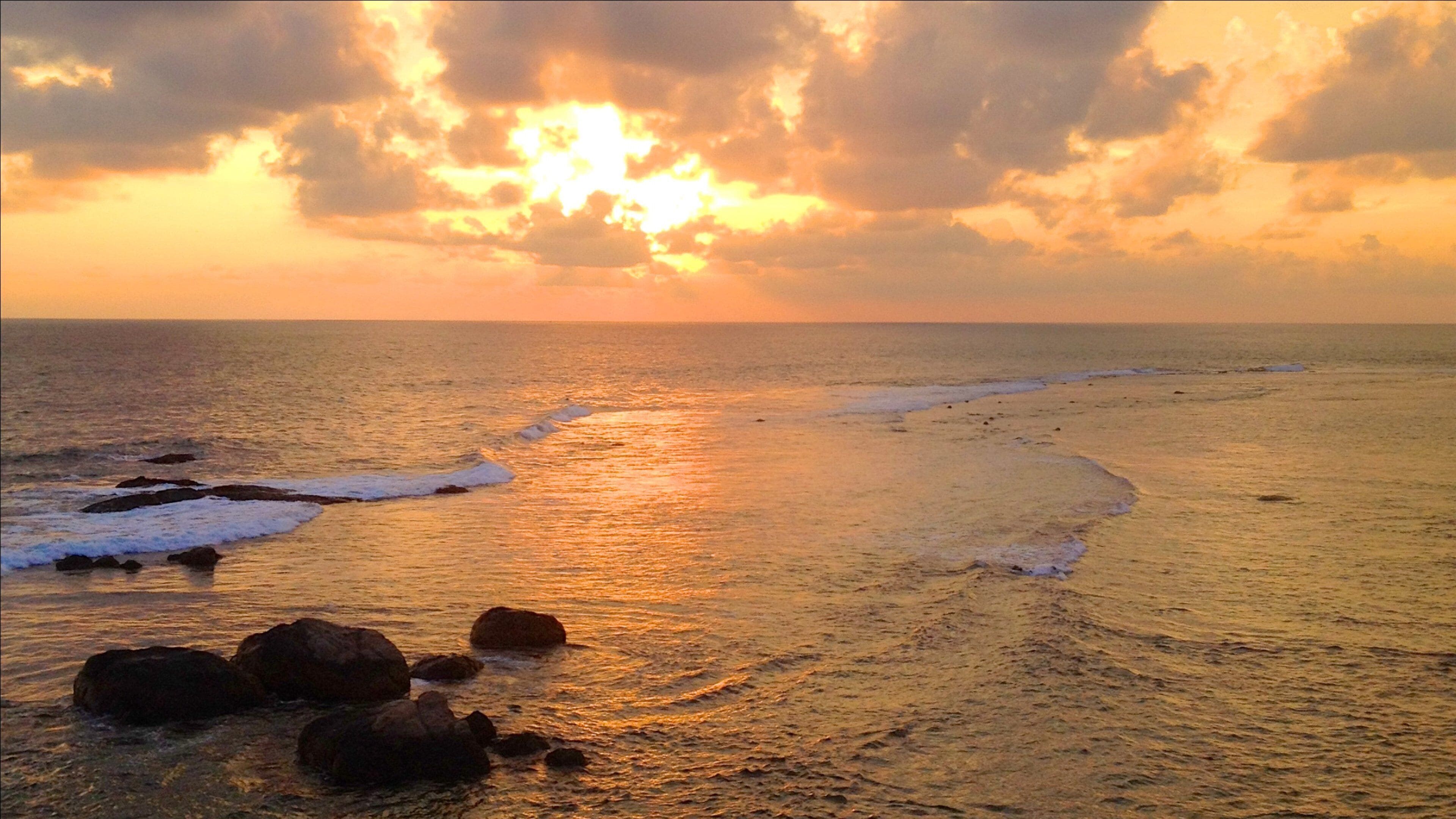 Galle showing a sunset, general coastal views and waves