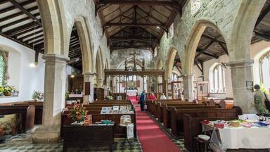 Grade I listed The church dates from the 13th century onwards and was restored in the late 19th and early 20th century. There is a fourth stage western tower, nave with clerestory and aisles, chancel, and south porch. The tower dates from the 13th century and has a battlemented parapet. The height of the tower was increased when the rest of the church is enlarged in the 14th century. The tower was restored in 1882. The chancel arch dates from the 13th century and has two corbel heads. The south aisle dates from the 15th century and is the exterior has gargoyles. The south porch is also from that date. The nave arcades are of five bays with octagonal piers and dates from the 14th century. The chancel is of brick from 1781. The nave and chancel roofs are from the late 19th century with painted panels. There is a 15th century octagonal font which is quite unique, although there is a similar one at Covenham Saint Bartholomew (it has now been removed to Manchester) The elaborate carvings depict Virgin Mary and Jesus, Saints Simon and Jude, Saint James the less and Saint Bartholomew and more. There are figures around the stem depicting various Saints, and at the base of the symbols of the four evangelists, a lion, Eagle, Ox and Angel. There are two incised slabs from the late 15th century. The church was restored in 1869, at a cost of £1000. The church has an old Forster and Andrews barrel organ from 1851, and a one manual Forster and Andrews organ still in use.