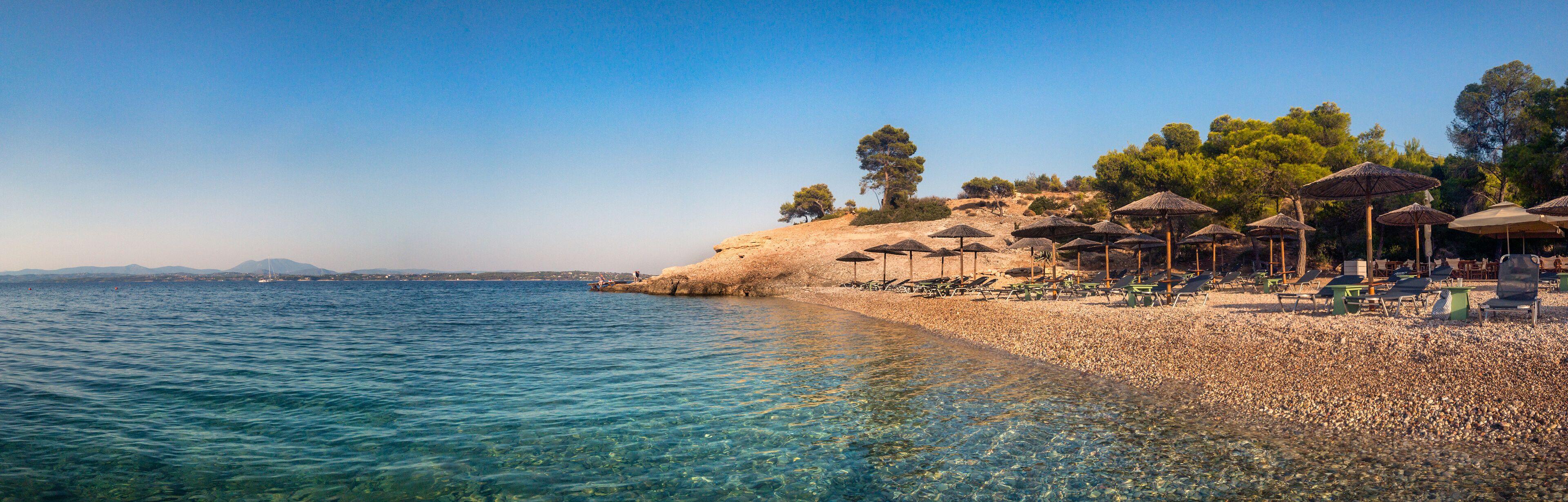 Panoramic view of the Vrelos beach in Spetses Island, Greece.