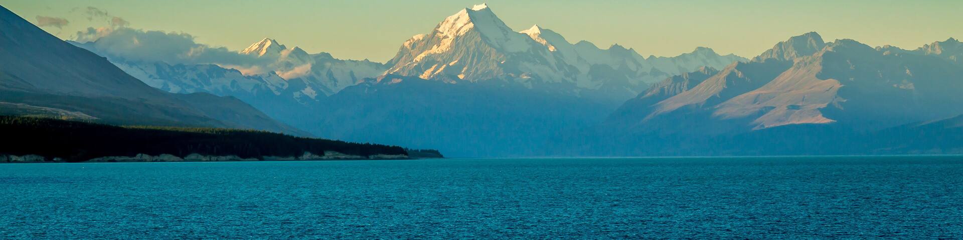 A view of Mount Cook at sunset from the shore at Lake Pukaki