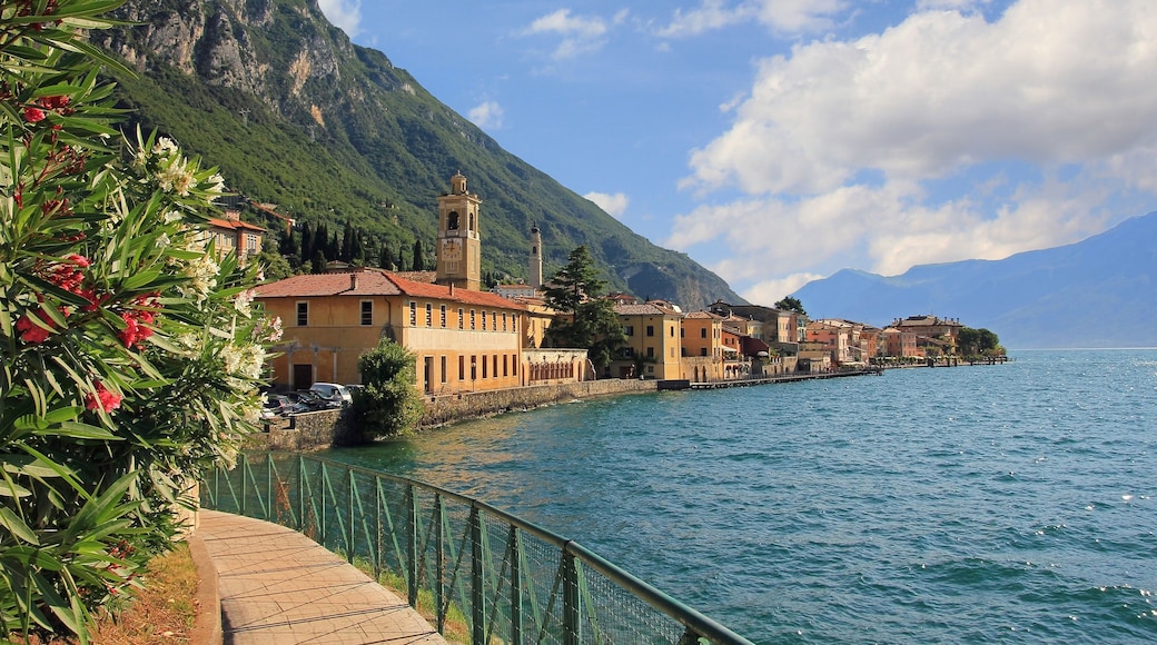 pictorial village gargnano, lago di garda, lakeside promenade with oleander and church; Shutterstock ID 278755586